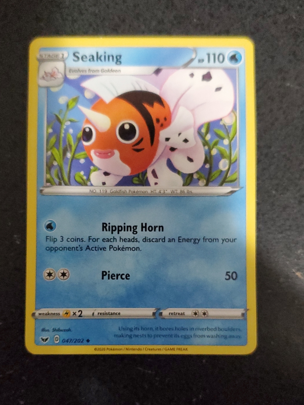 Pokemon Seeking Water-Type Card with Yellow Border